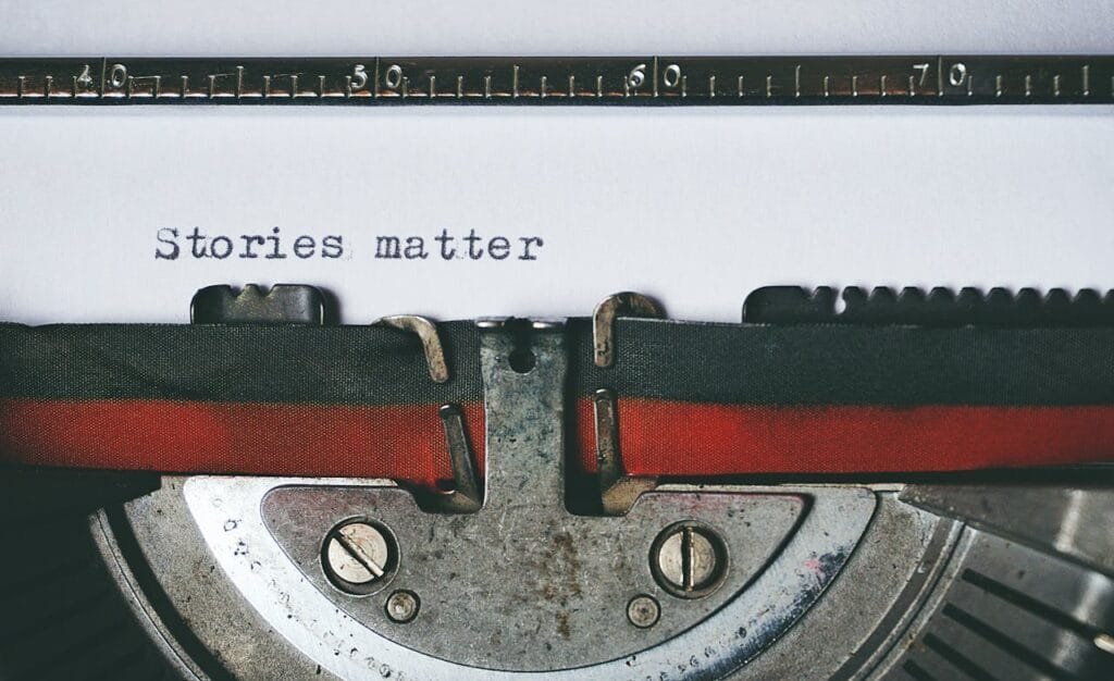 A vintage typewriter with the words Stories matter